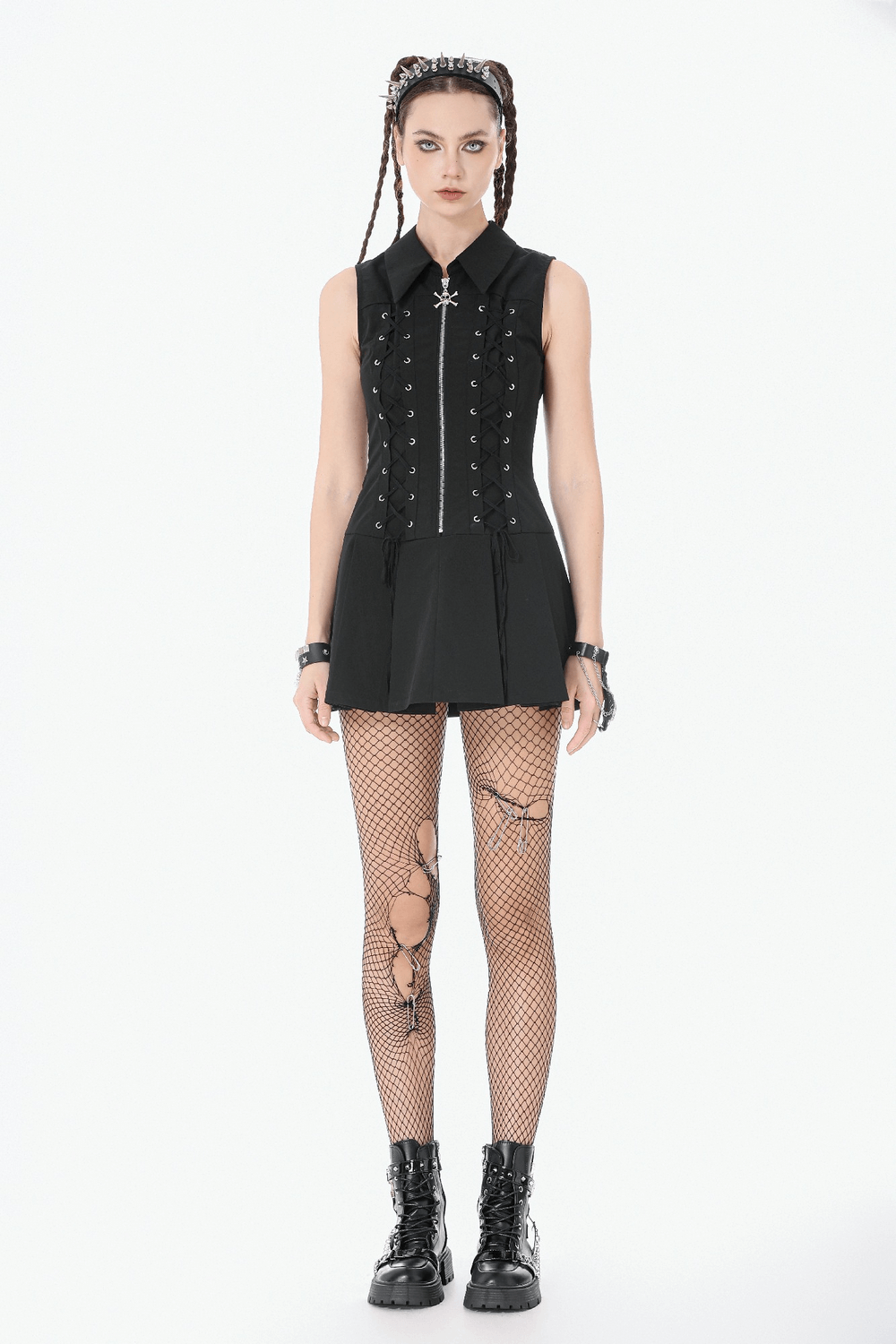 Black Gothic Lace Up Zip Front Pleated Mini Dress showcased with edgy accessories and fishnet tights.