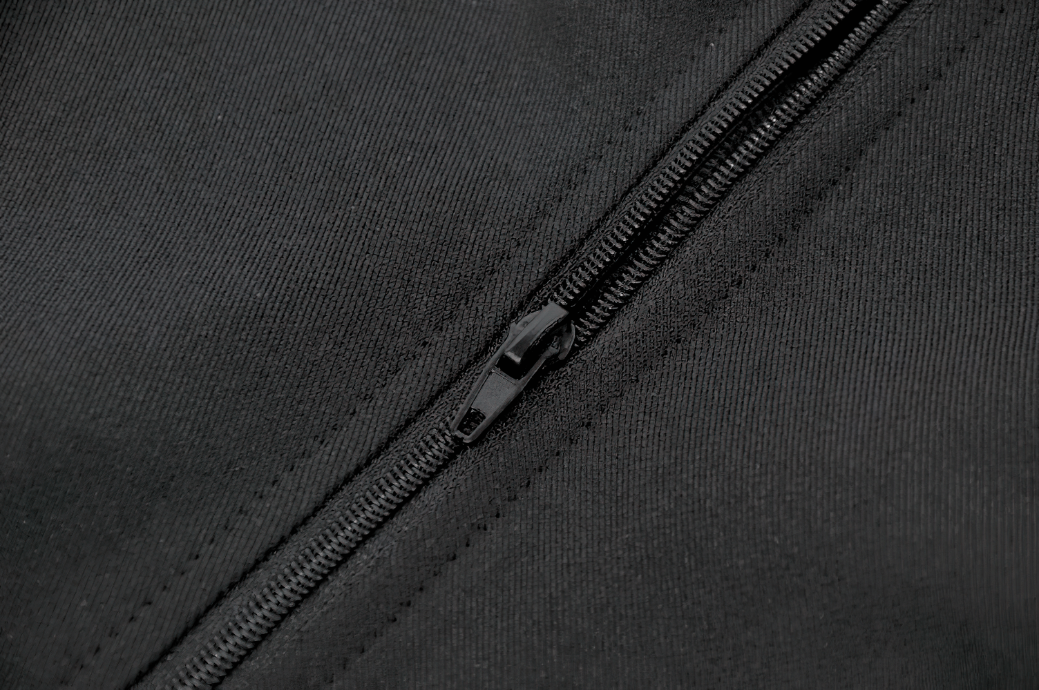 Close-up of the zipper detail on the Black Gothic Lace-Up Zipper Vest with Stud Collar, showcasing its punk-style feature.