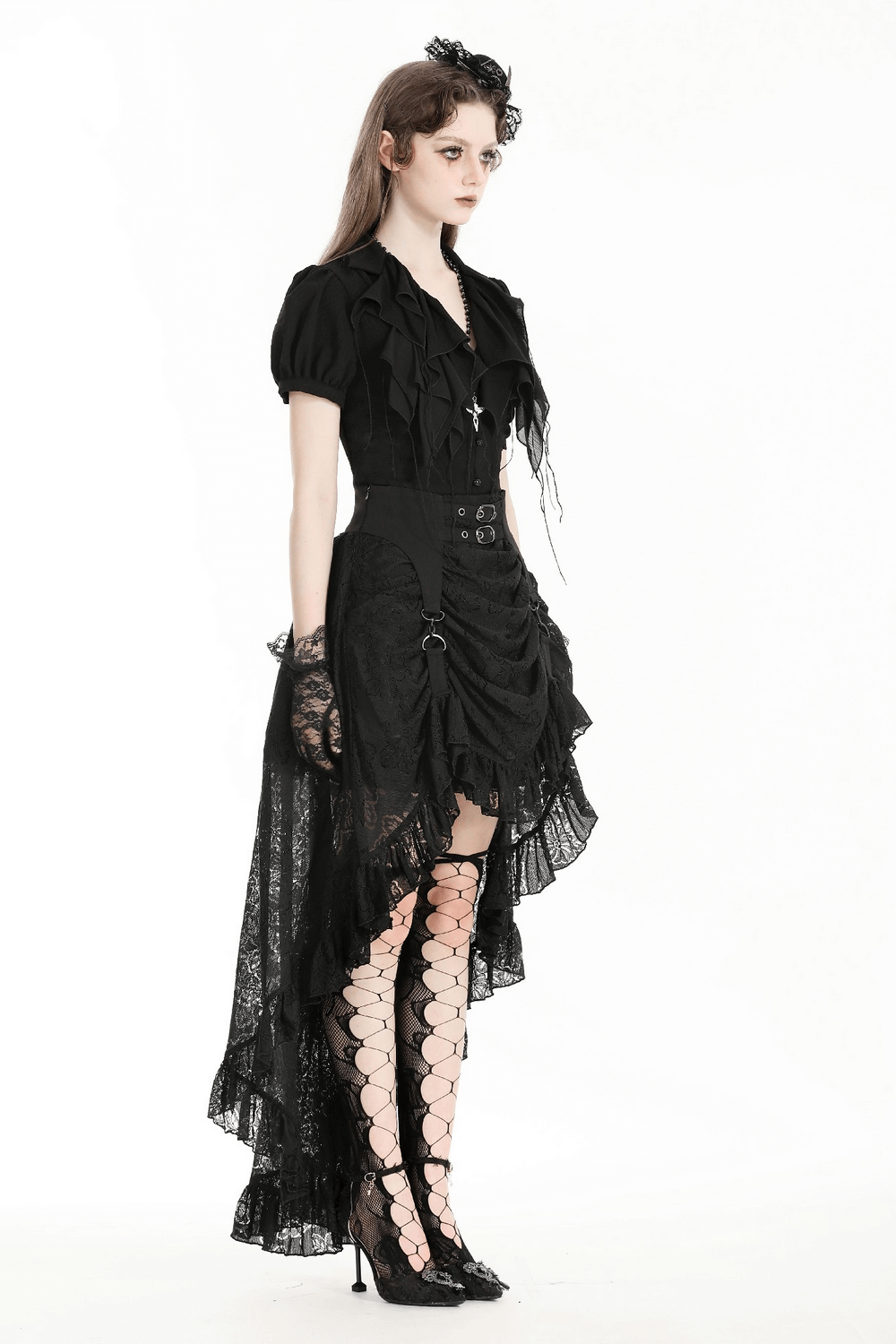 Model wearing a black gothic layered lace skirt with asymmetrical hem for elegant evening wear.