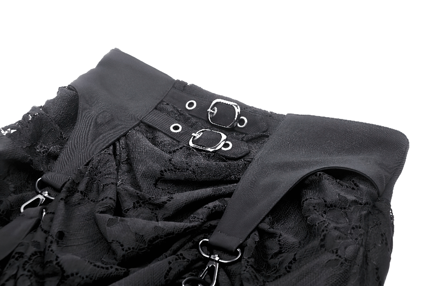 Close-up of the adjustable straps and intricate lace detailing on a black gothic layered skirt.