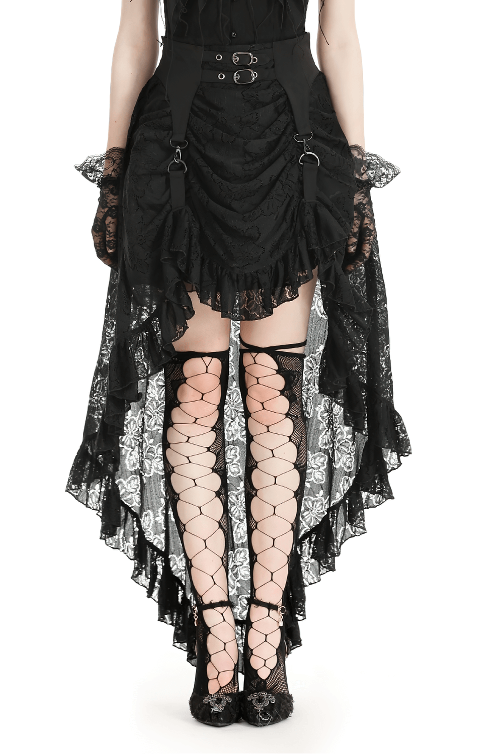 Styled black gothic layered lace skirt with asymmetrical hem and fishnet stockings, perfect for evening wear.