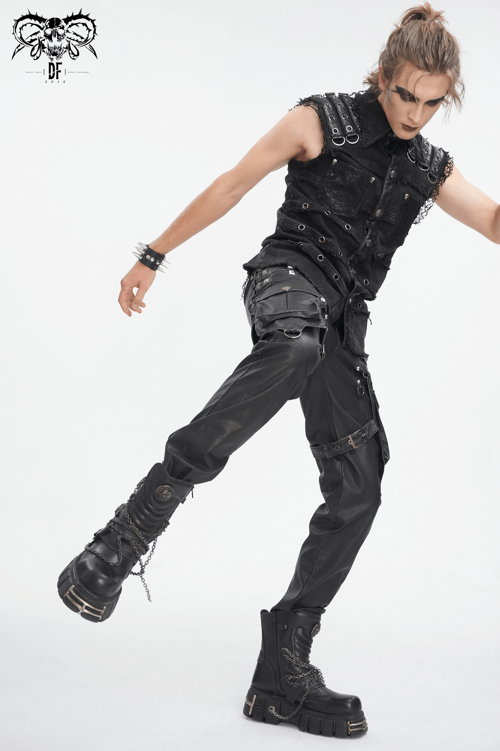 Model showcasing black gothic leather pants with buckles and straps, styled for a punk fashion look.