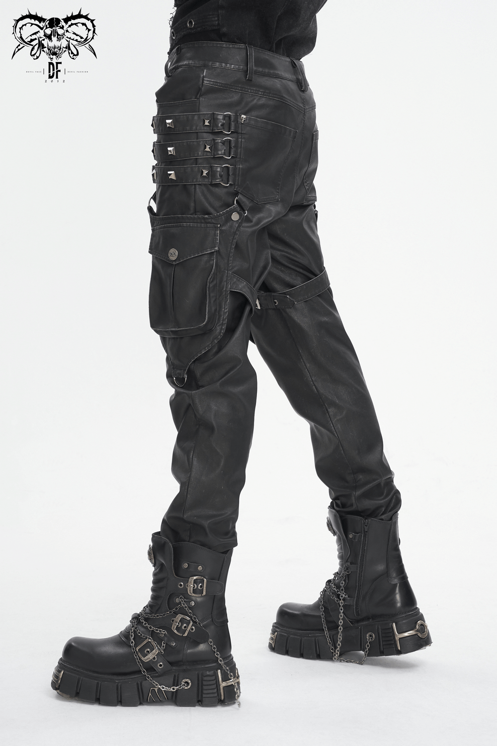 Black gothic leather pants with buckles and straps, paired with edgy black boots for a striking punk look.