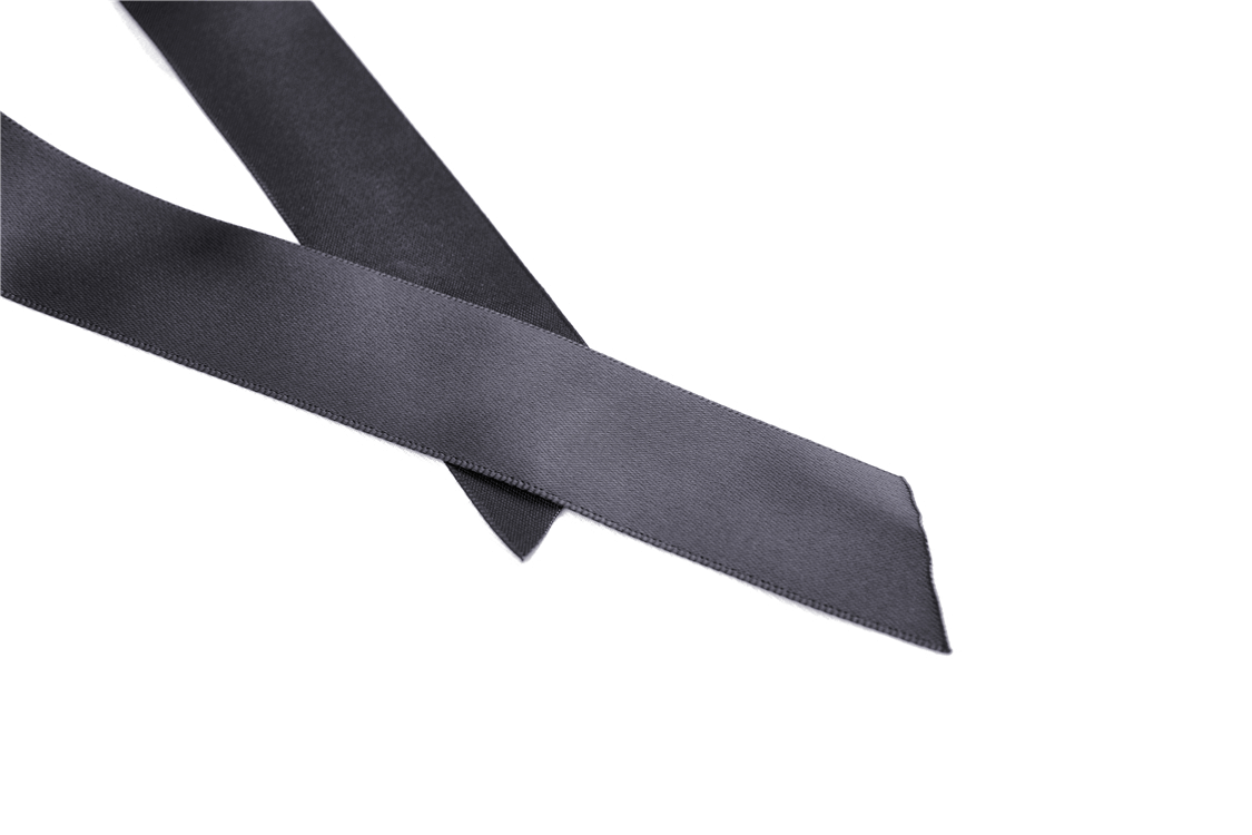 Elegant black satin ribbon laying flat, perfect for embellishing dresses or hair accessories in gothic styles.