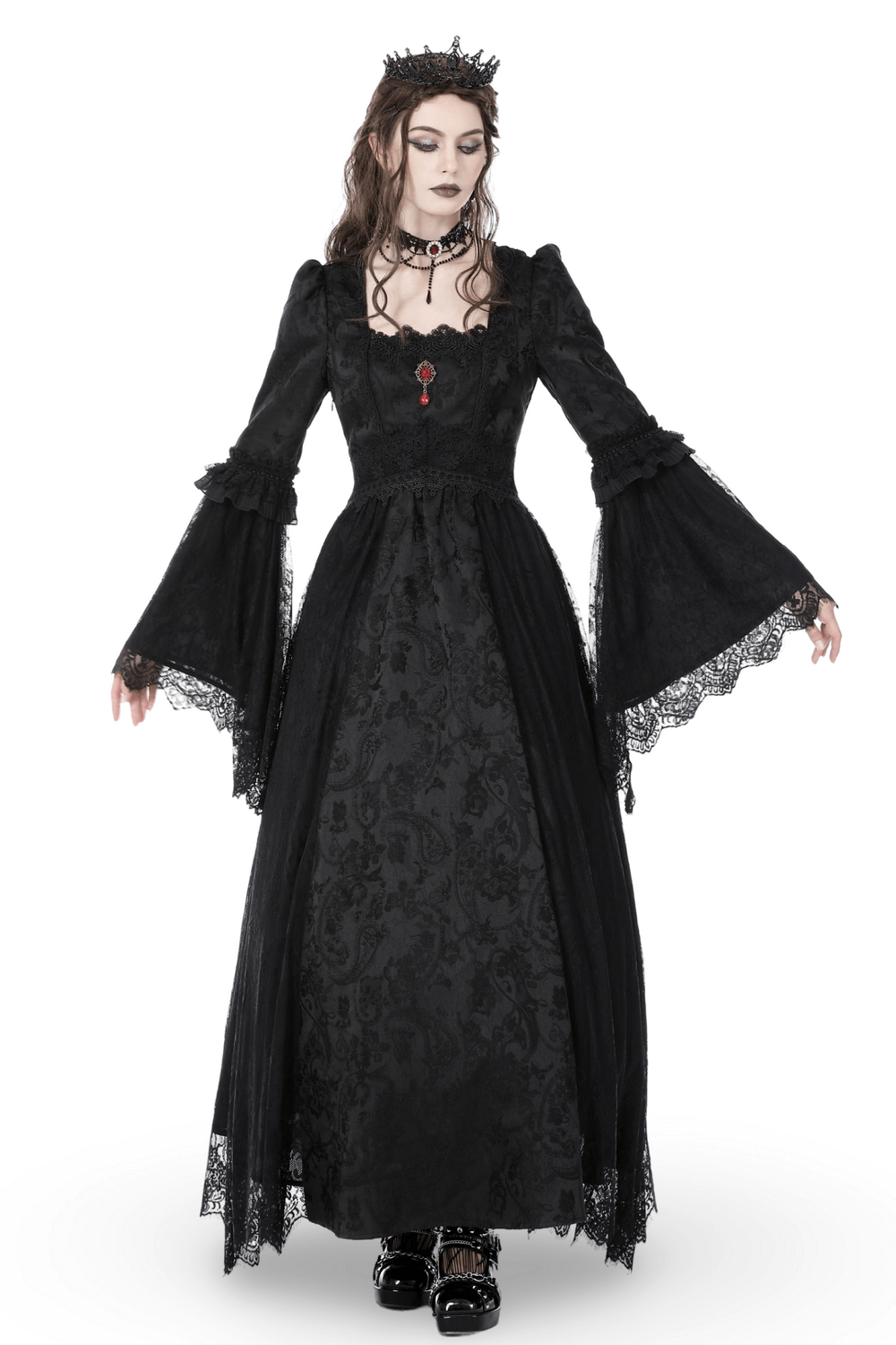 Gothic black lace maxi dress with long bell sleeves and red brooch. Victorian elegance for special occasions.