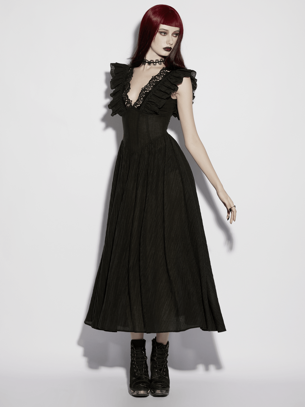 Alt Tag: Black Gothic Maxi Dress with Lace V-Neck and Ruffle Sleeves on model, flowing black maxi gown with ruffle shoulders