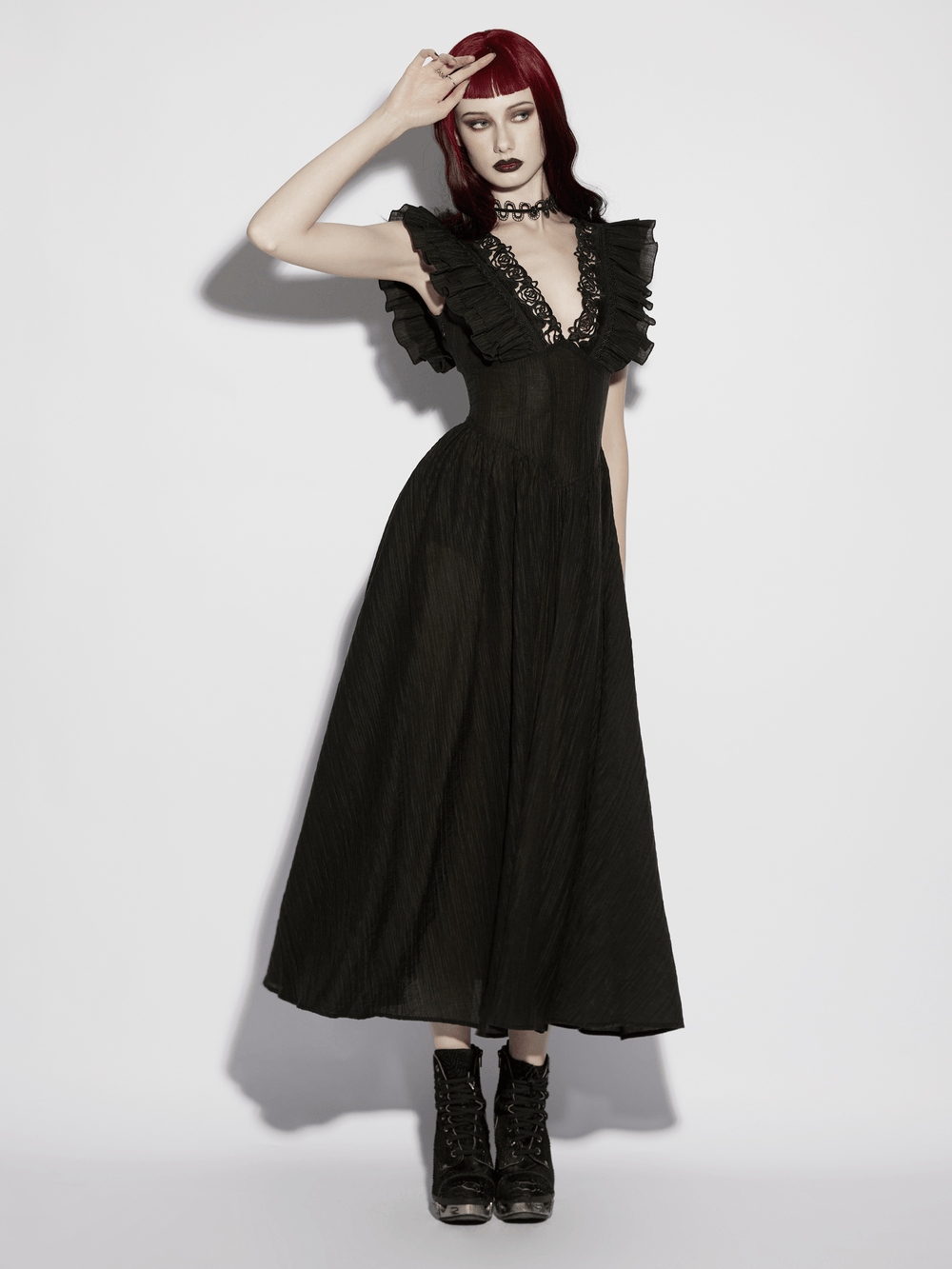 Alt Tag: Black Gothic Maxi Dress with Lace V-Neck and Ruffle Sleeves on model, floor-length black gown with ruffle sleeves
