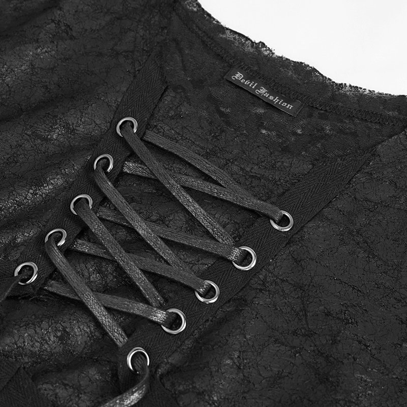 Close-up of black gothic men's t-shirt neckline with lace-up design and brand label, showcasing stylish details.