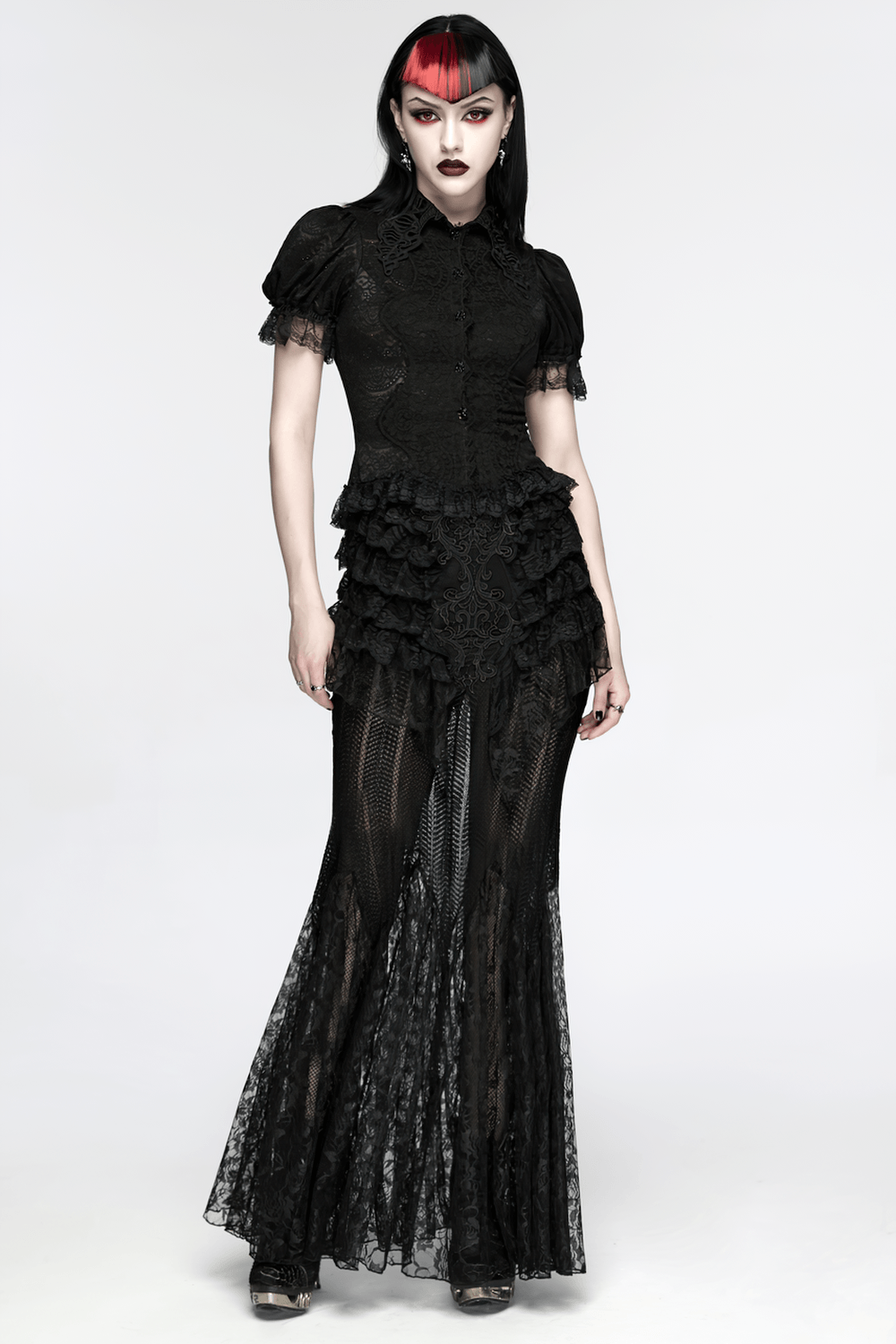 Black Gothic Mermaid Lace Maxi Skirt with Ruffles worn by a model, showcasing a dramatic silhouette and intricate lace details.