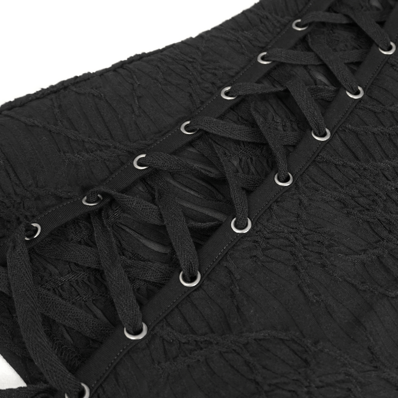 Close-up of lace-up sides on a black gothic mesh top, showcasing intricate detailing and adjustable fit.
