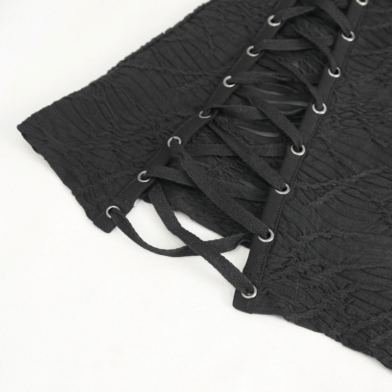 Close-up of the lace-up sides of a black gothic mesh top, showcasing intricate detailing and adjustable strings.