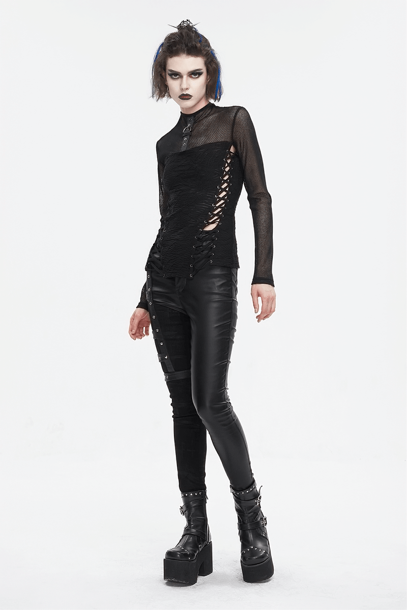 Gothic women's black mesh long-sleeves top with lace-up sides, paired with edgy leather pants and platform boots.
