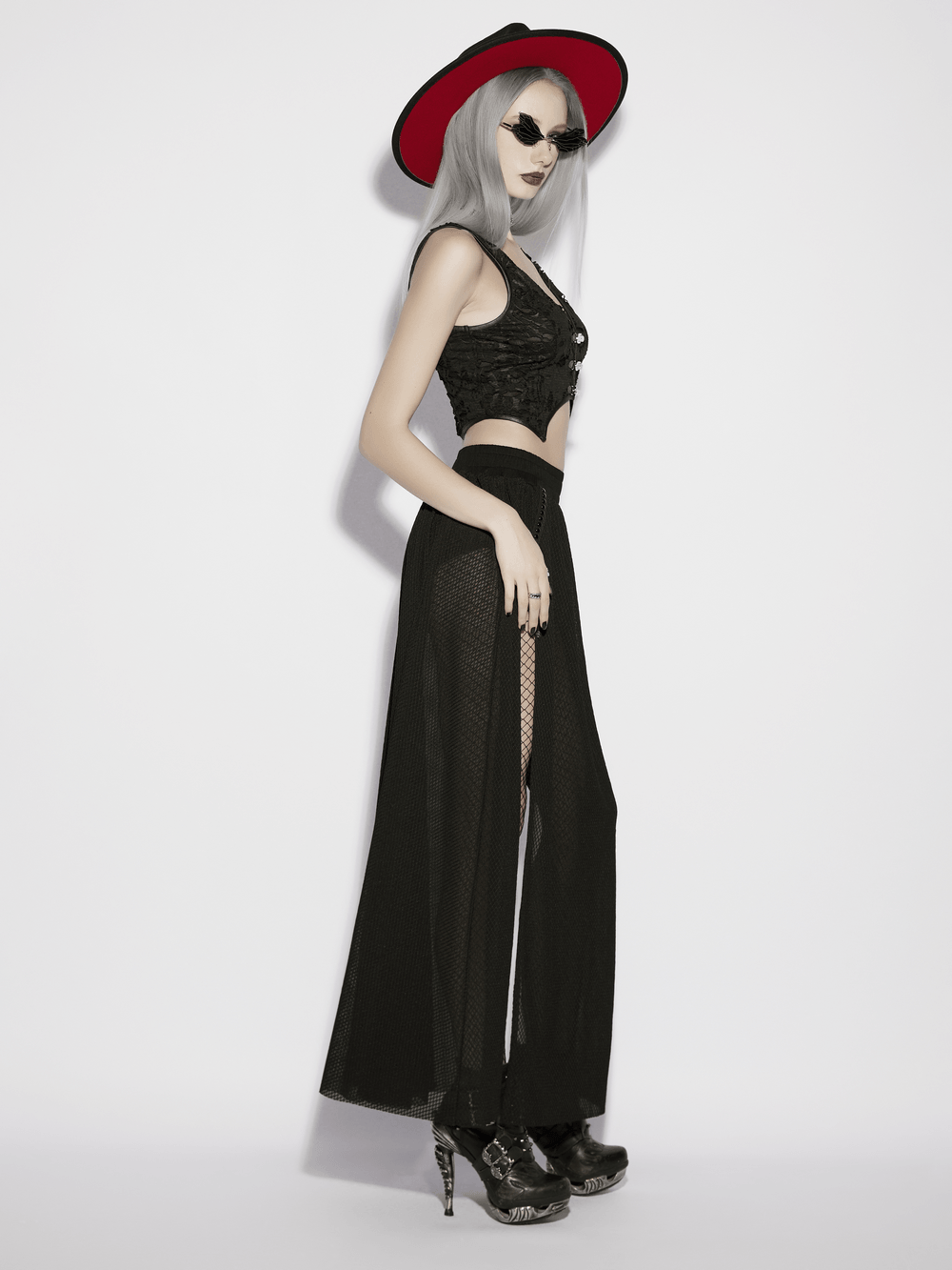 Black Gothic Mesh Maxi Skirt with Side Slit Detail worn with a stylish top and accessories.