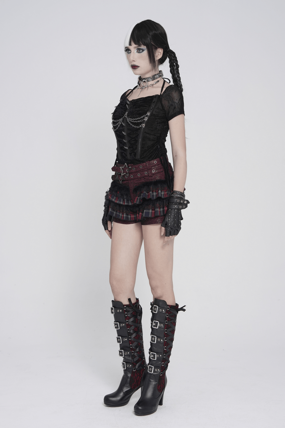 Black Gothic Mesh Short-Sleeved Top with Chains and Lacing worn by model styled in edgy gothic fashion.