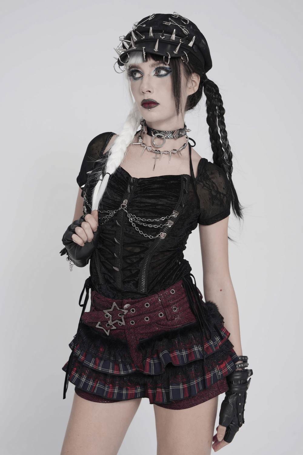 Black Gothic Mesh Short-Sleeved Top with Chains and Lacing styled with edgy accessories and plaid shorts.