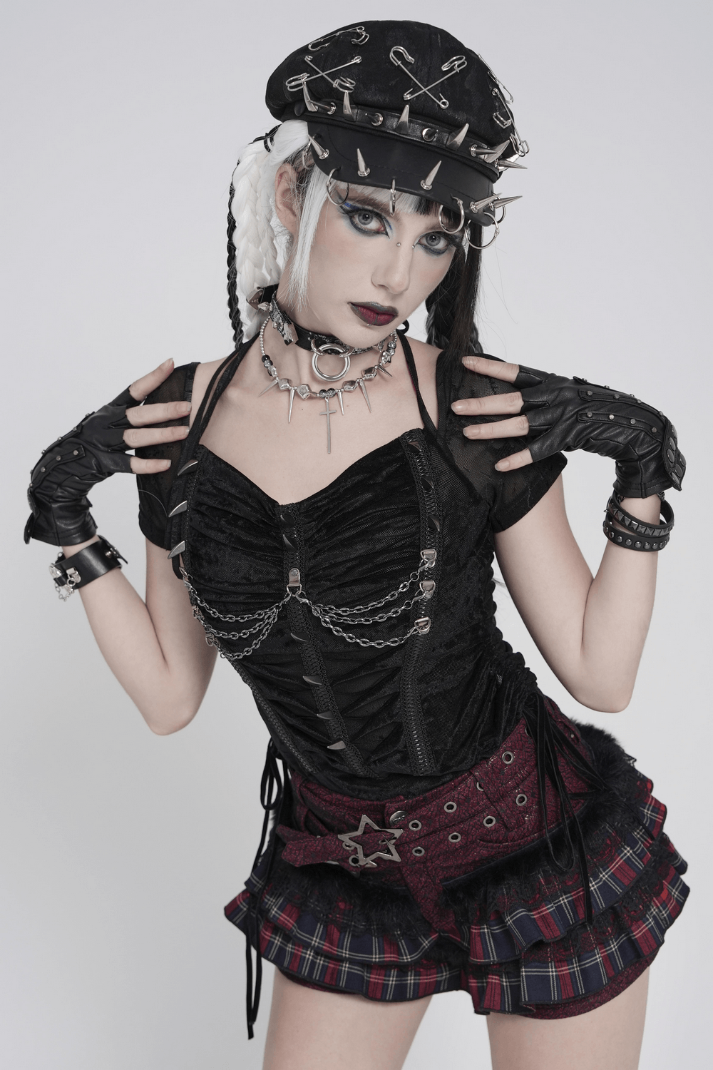 Black Gothic Mesh Short-Sleeved Top with Chains and Lacing worn by a model with accessories and punk style.