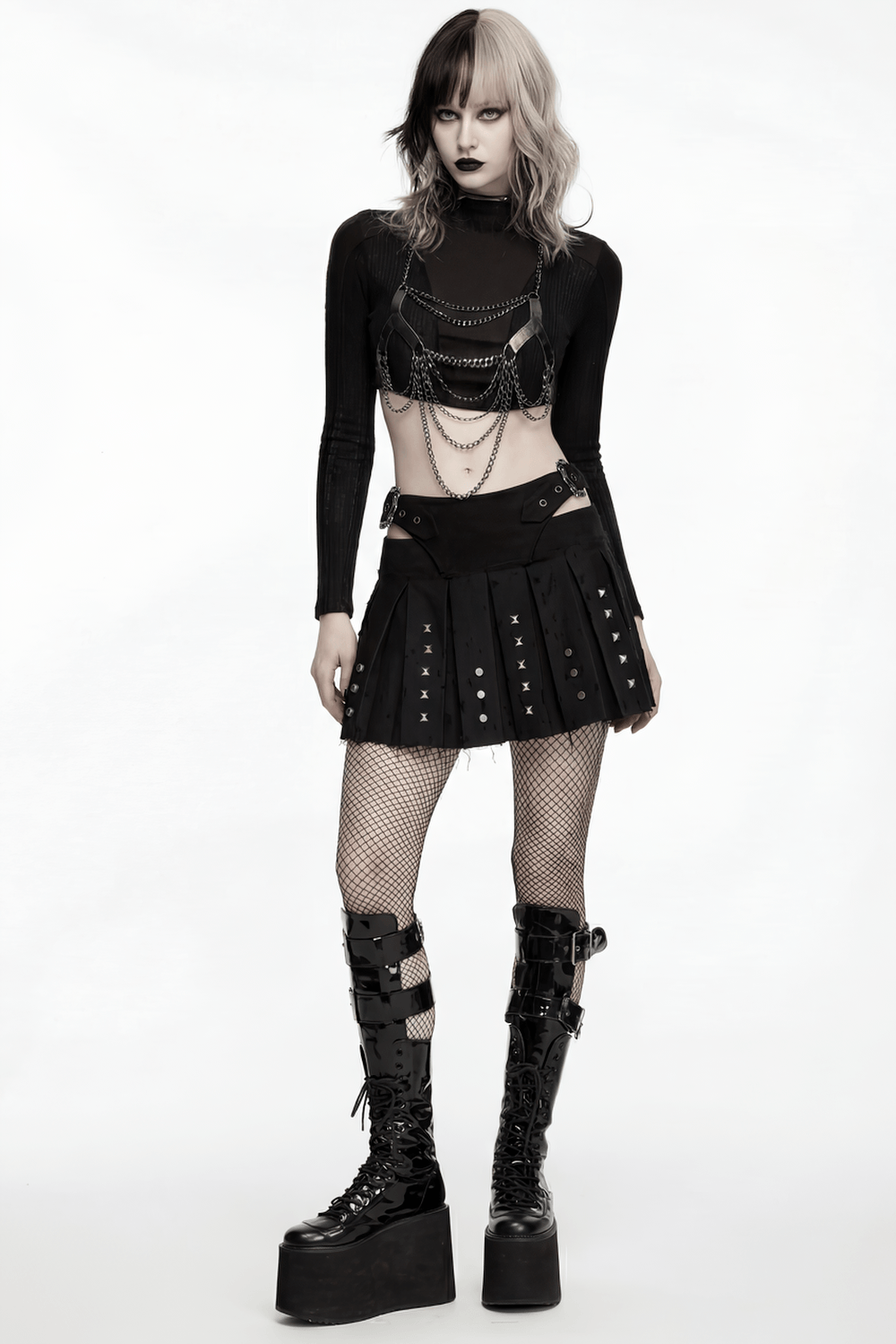 Black Gothic Mini Skirt with Metal Rivet Panels worn with edgy accessories and platform boots.