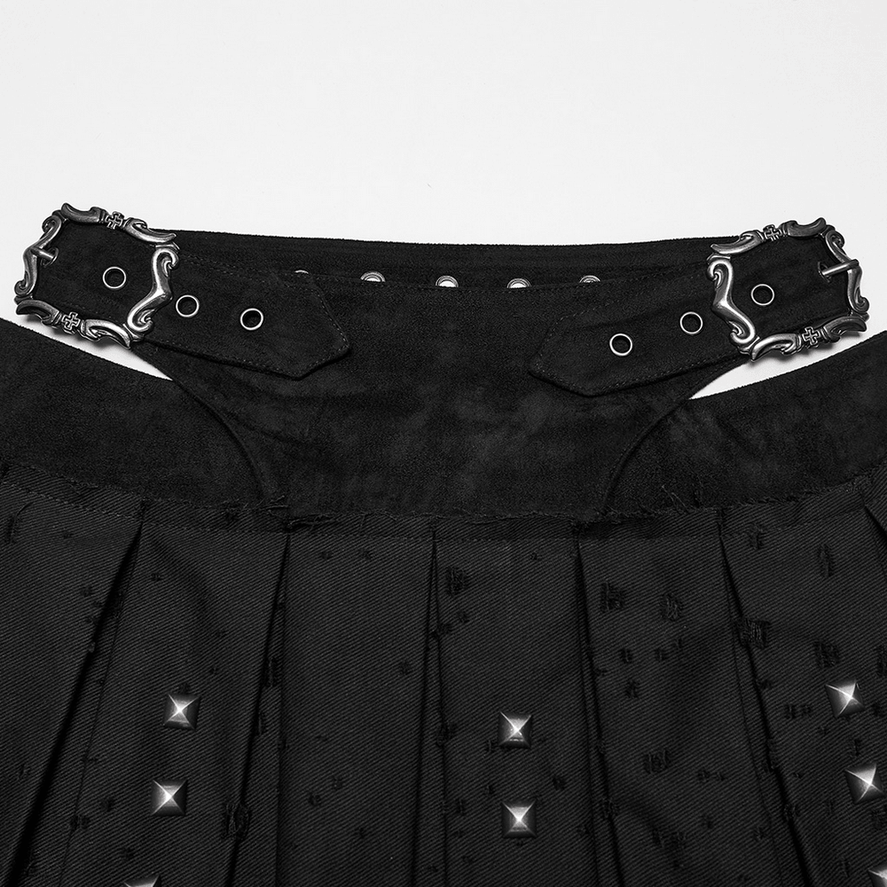 Black Gothic Mini Skirt with Metal Rivet Panels showcasing buckle and pleated details.