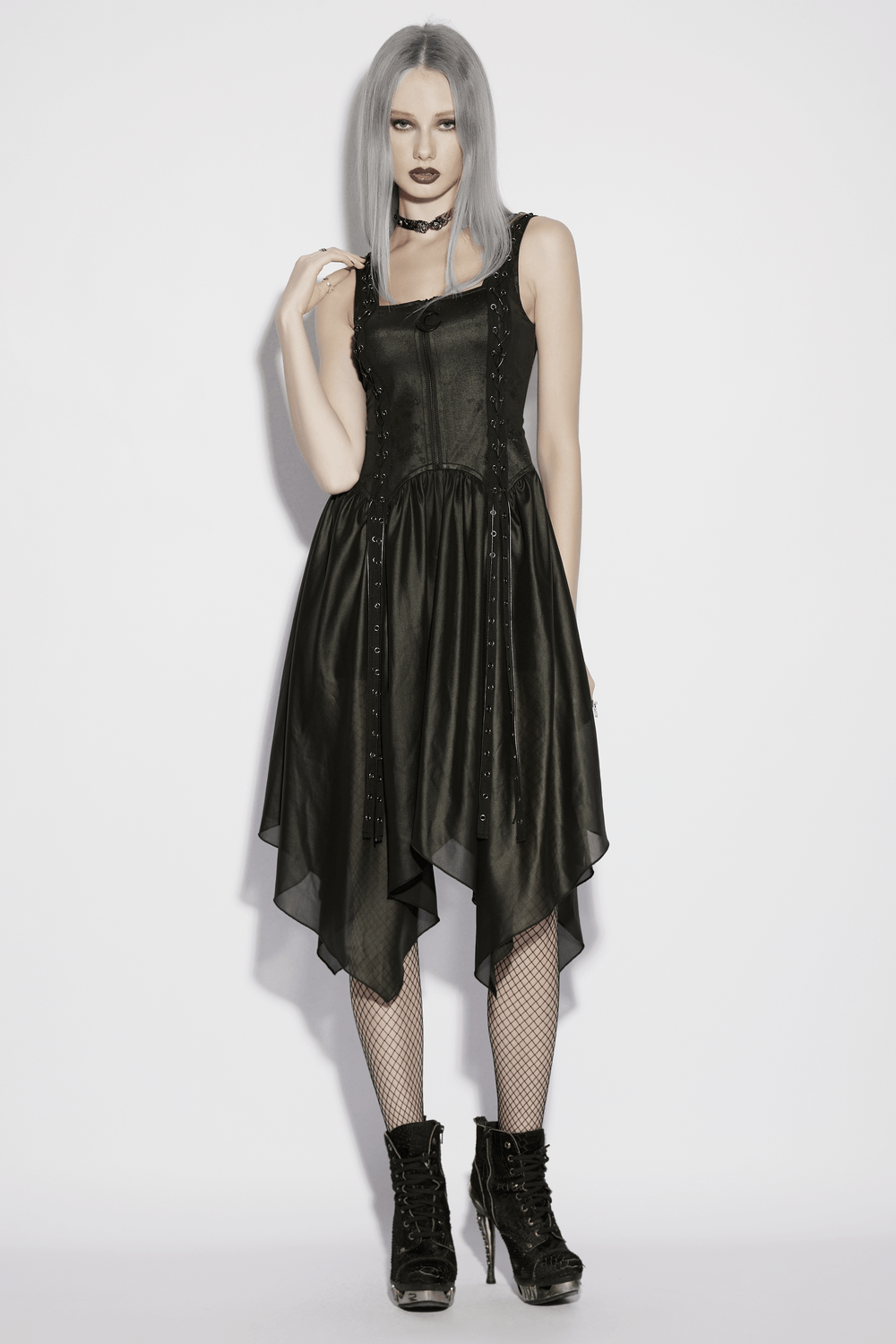 Black Gothic Moon Zip Handkerchief Hem Midi Dress worn by model with grey hair and dark makeup.