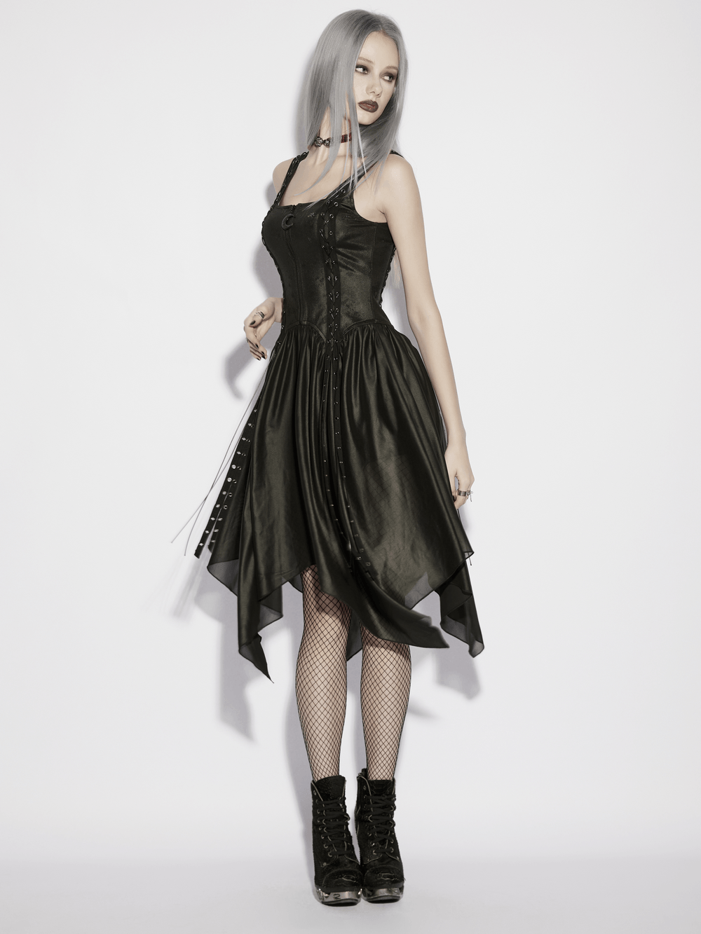Black Gothic Moon Zip Handkerchief Hem Midi Dress on a model showcasing its punk style and unique crescent zipper.
