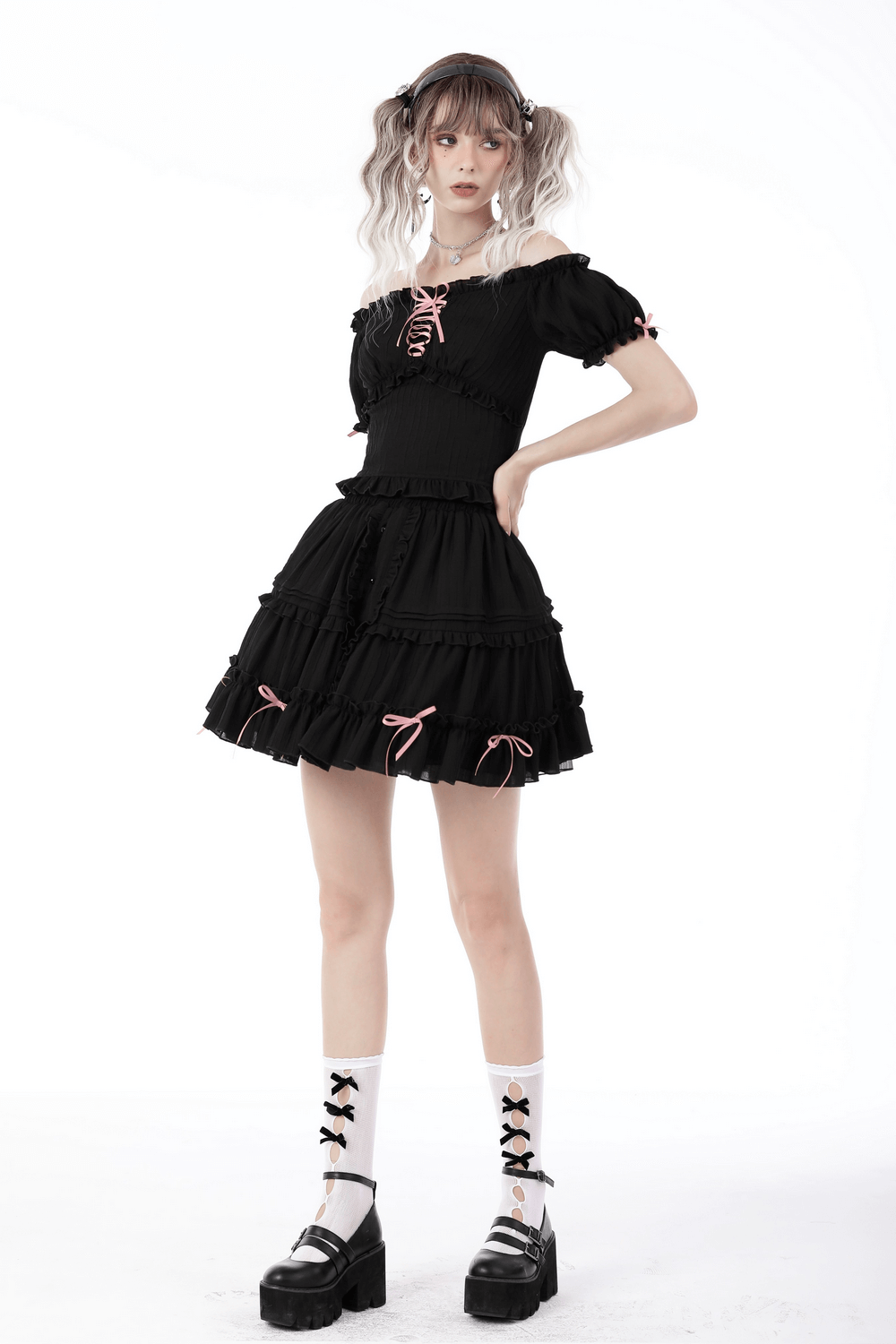 Black Gothic off-the-shoulder top with pink ribbon accents, perfect for a dark romantic aesthetic.