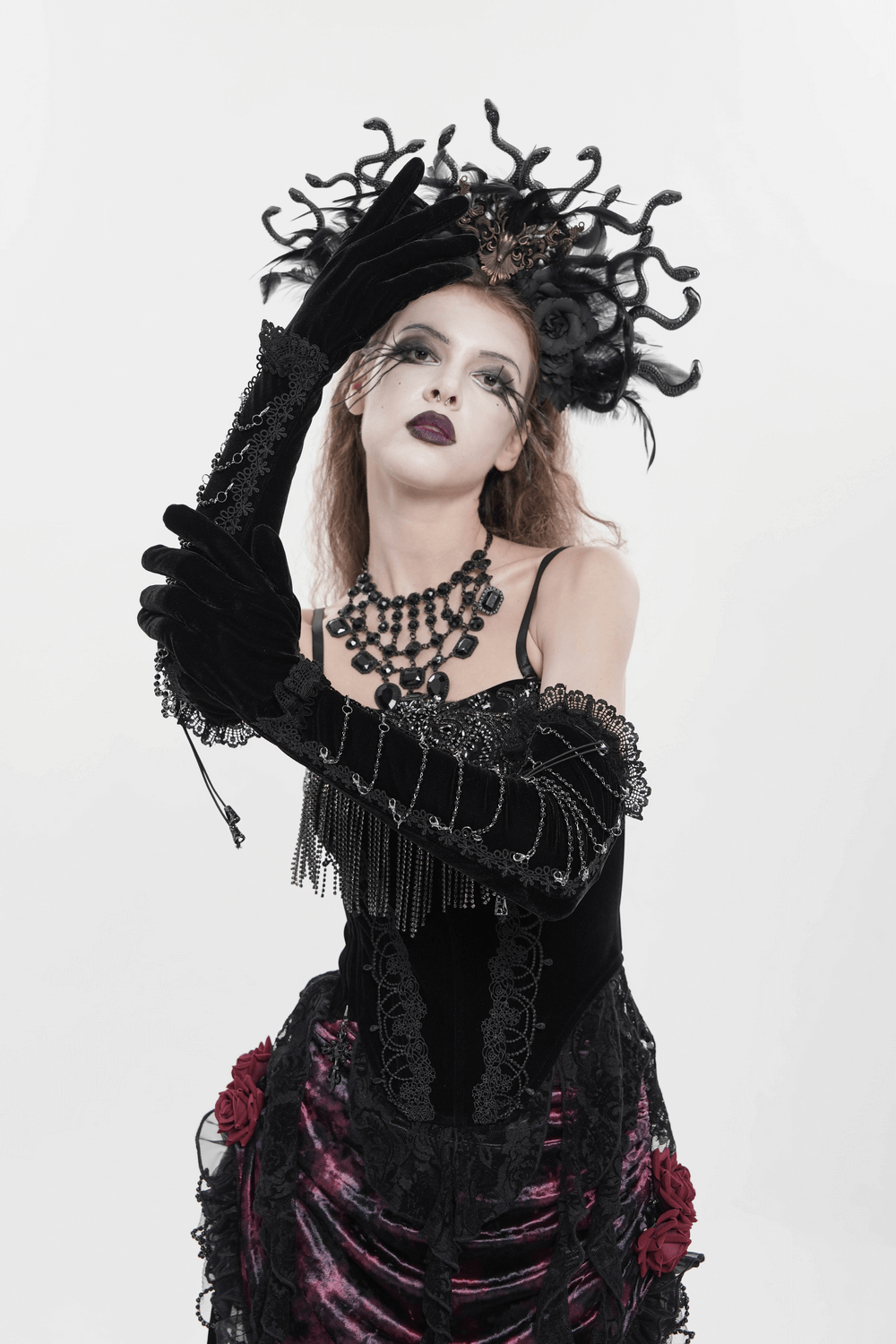 Alt Tag: Black Gothic Opera Gloves with Lace and Chains on model, long black velvet gloves with lace cuffs and chain wrap for Victorian goth cosplay