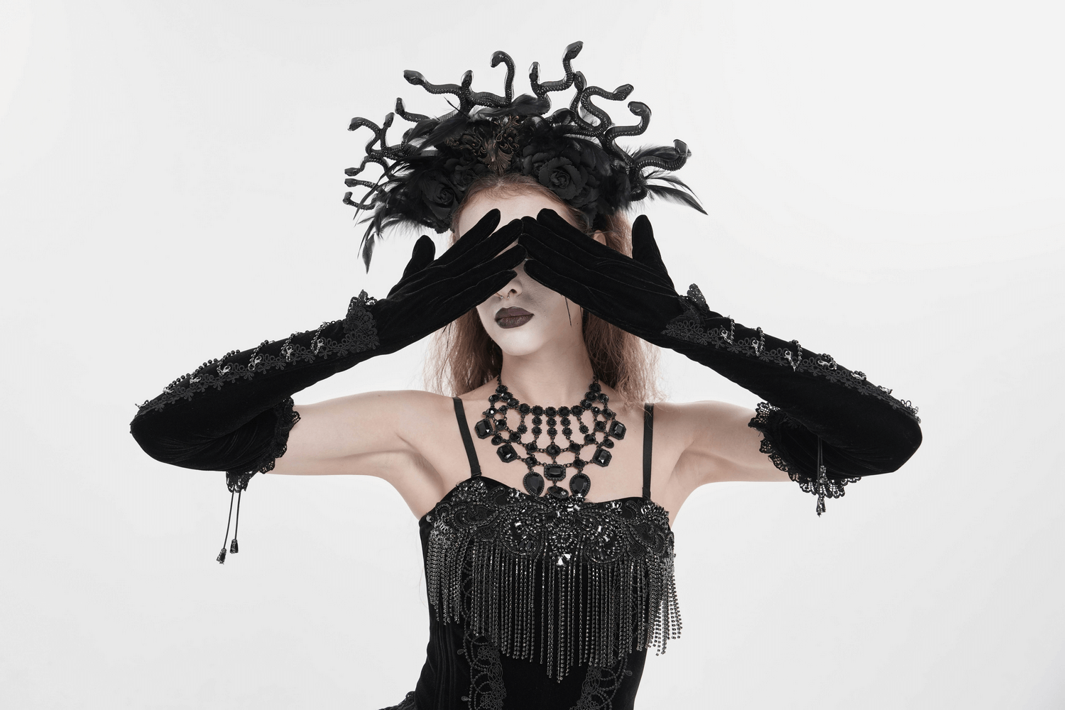 Alt Tag: Black Gothic Opera Gloves with Lace and Chains on model, long black velvet gloves with lace cuffs and chain wrap for gothic evening wear