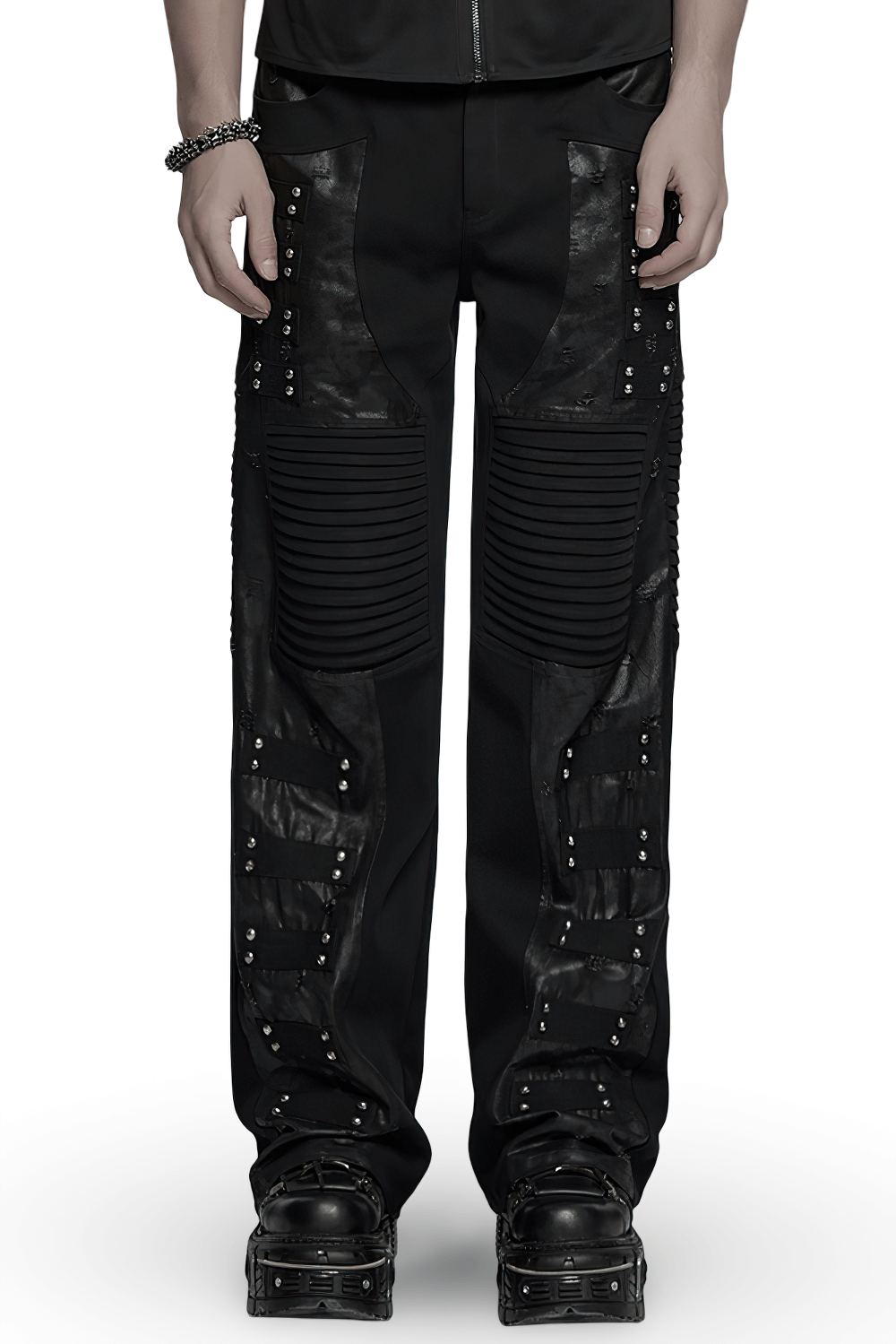 Black gothic pants with pleated panels and rivets for a punk-inspired look.