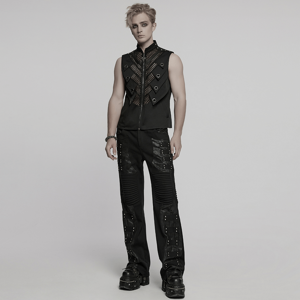 Stylish model wearing black gothic pants with pleated panels, rivets, and a punk-inspired vest, embodying rebellious fashion.