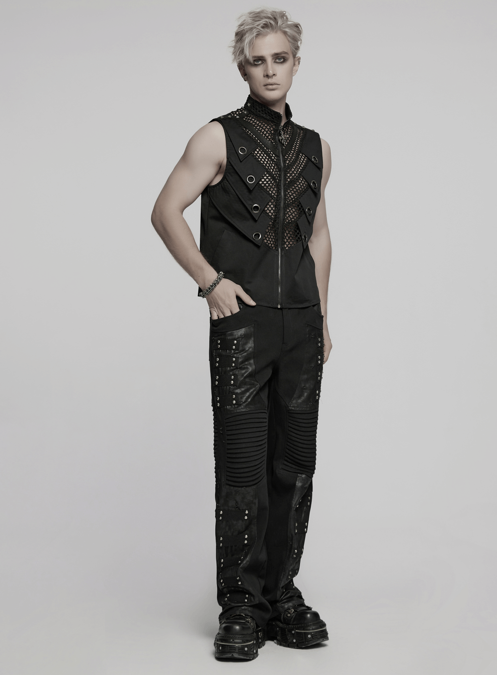 Black Gothic pants with pleated panels and rivets, perfect for an edgy punk style outfit.