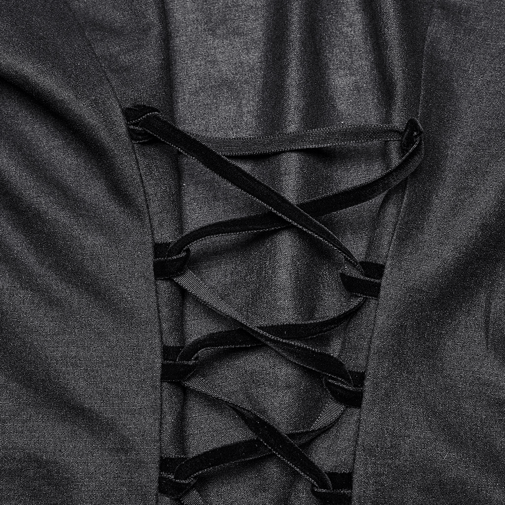 Close-up of the lace-up back detail on a black gothic shirt, showcasing elegant velvet ribbons and structured fabric.