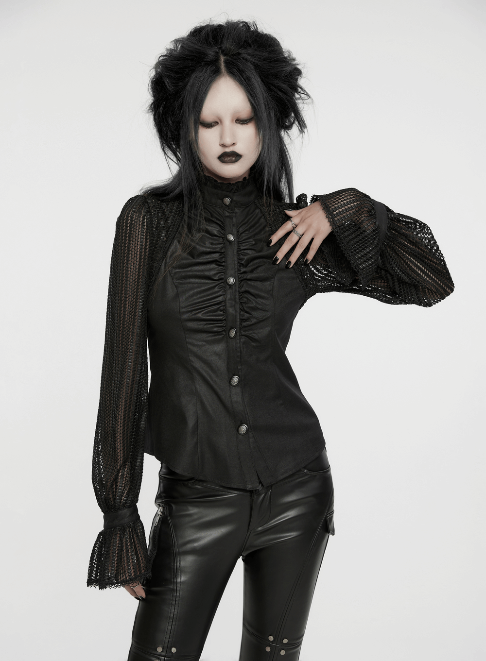 Elegant black gothic pleated shirt featuring mesh lantern sleeves and lace-up back for a unique, bold look.