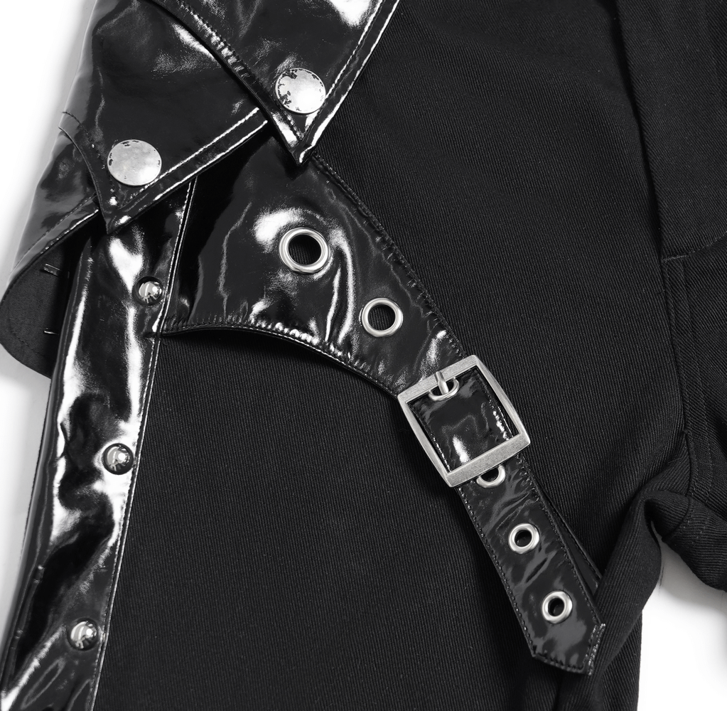 Close-up of black gothic punk pants with shiny buckle and strap detailing, highlighting edgy style.