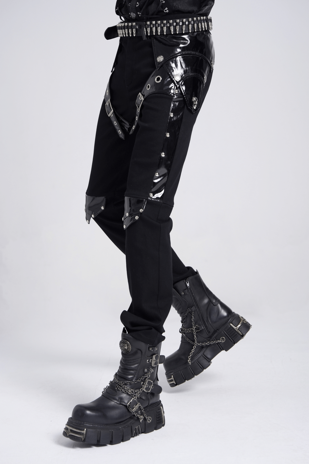 Black gothic punk pants featuring studded buckle, strap details, and edgy leather-like accents.