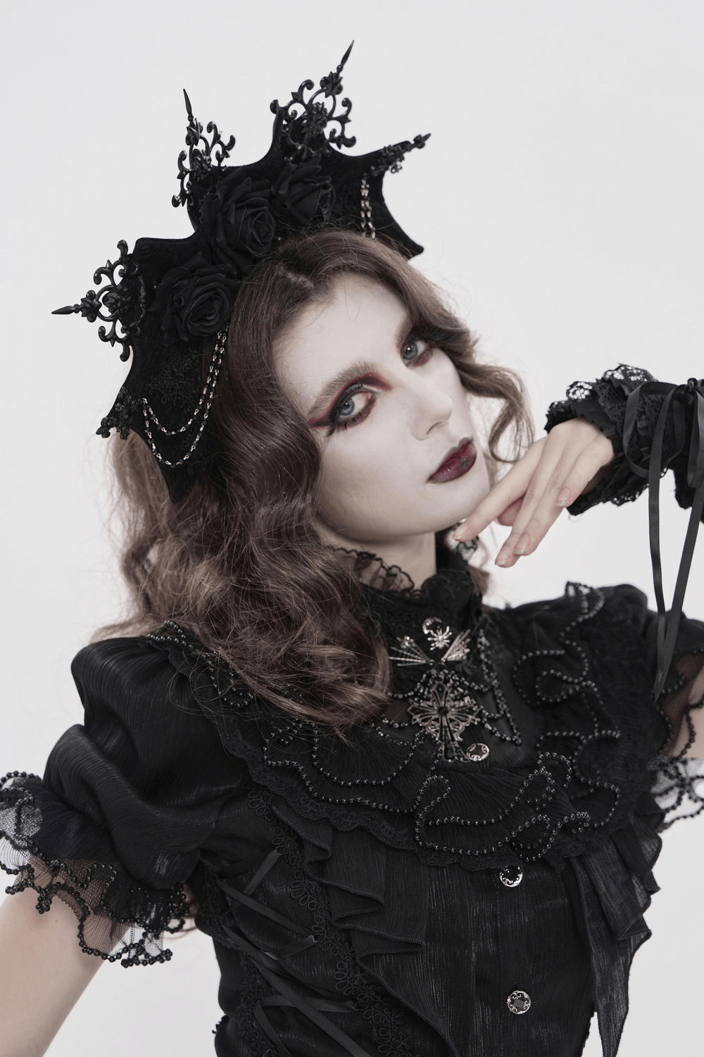 Black Gothic Rose Crown Headpiece With Lace Wings worn in a dramatic gothic look with a dark Victorian style.