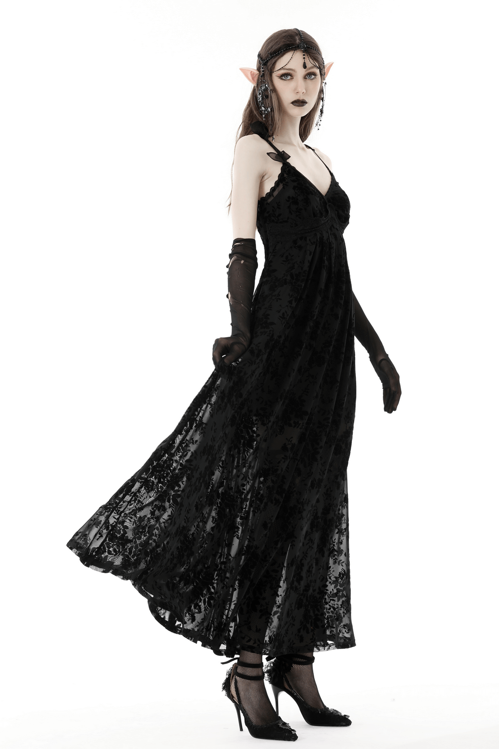Elegant black gothic lace maxi dress with sheer sleeves, perfect for dark occasions and embracing a mysterious vibe.