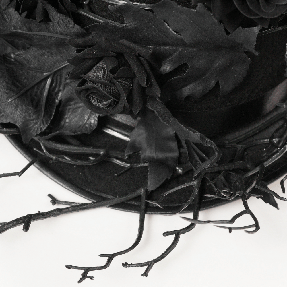Black Gothic Rose Top Hat with Branch Crown Trim featuring dark roses and thorny twig accents.