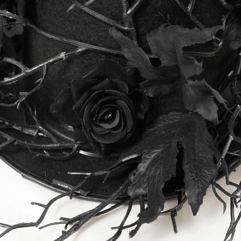 Black Gothic Rose Top Hat with Branch Crown Trim featuring dark roses and thorny twig accents.