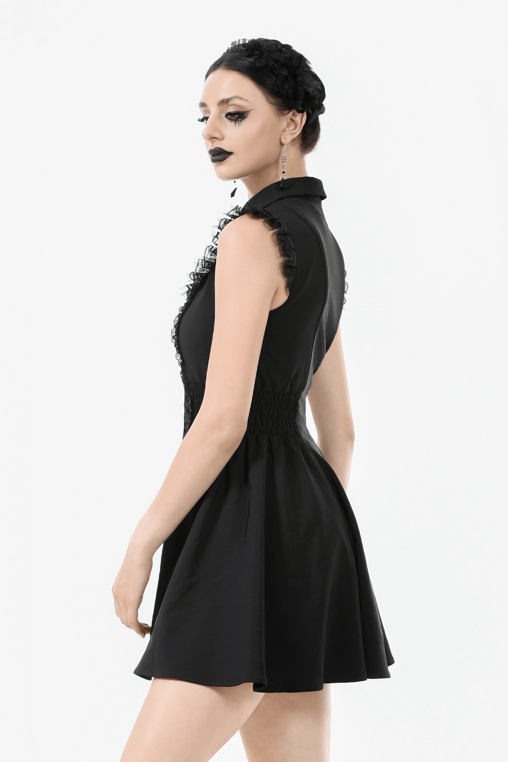Black Gothic Ruffle Front Dress with Buttoned Detailing showcasing ruffle detail and elegant fit.