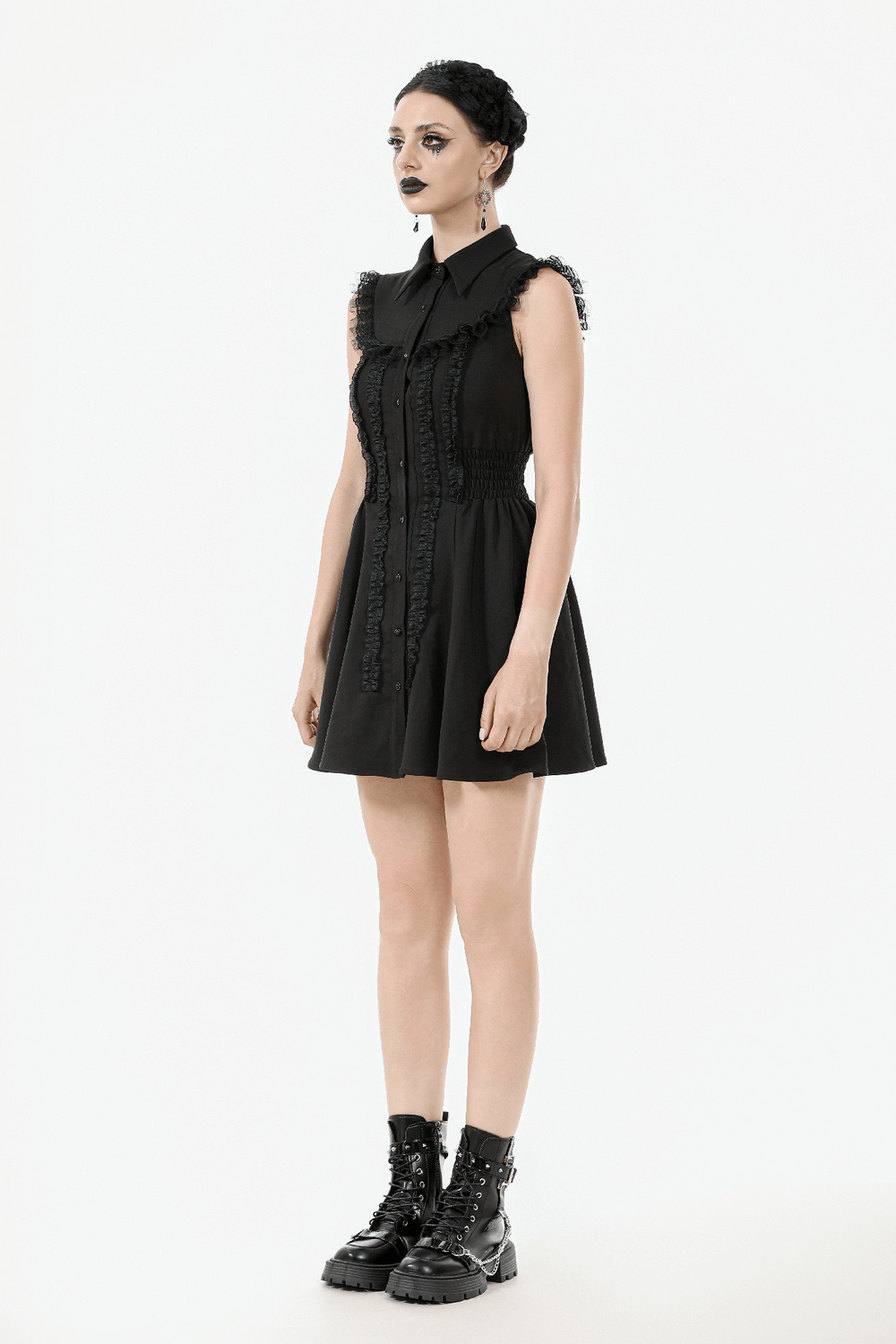 Black Gothic Ruffle Front Dress with Buttoned Detailing modeled by a model showcasing its elegant fit and Gothic style.