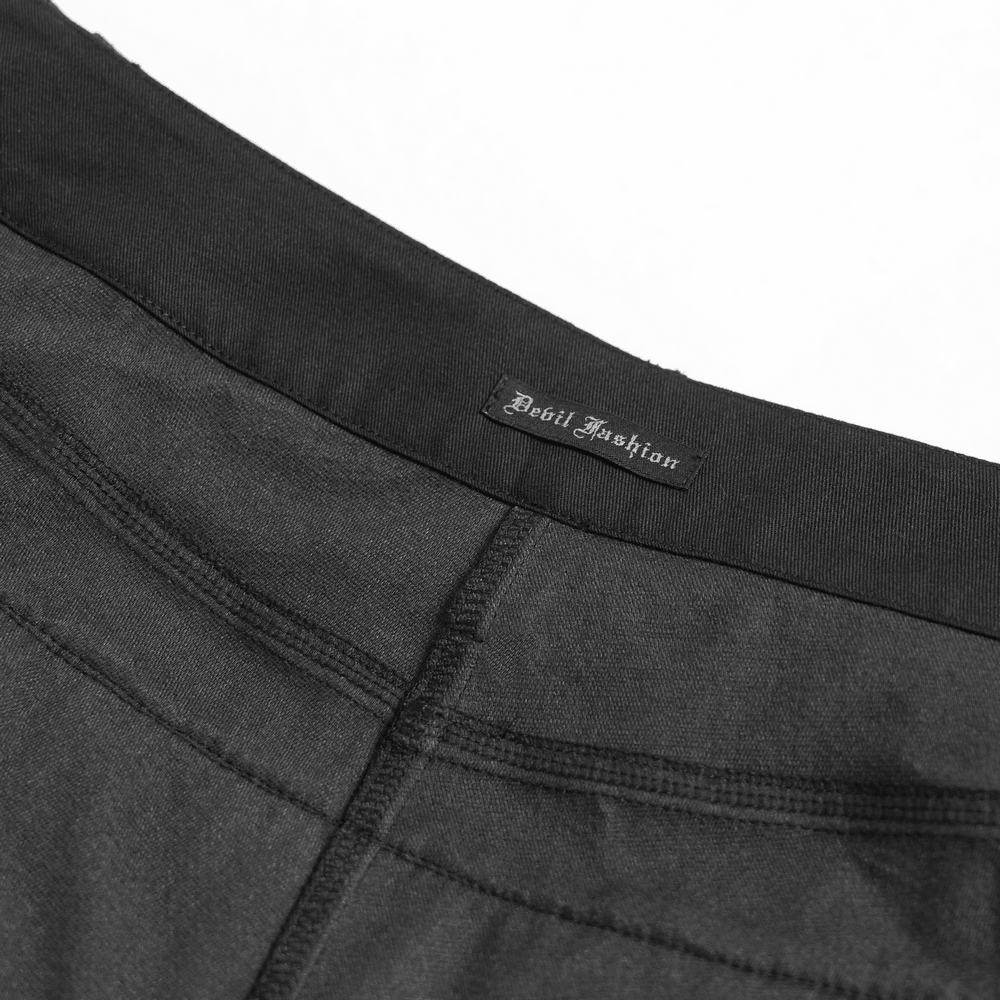 Close-up of the label on the Black Gothic Ruffle Skort with Star Belt Detail showcasing its unique design by Devil Fashion.