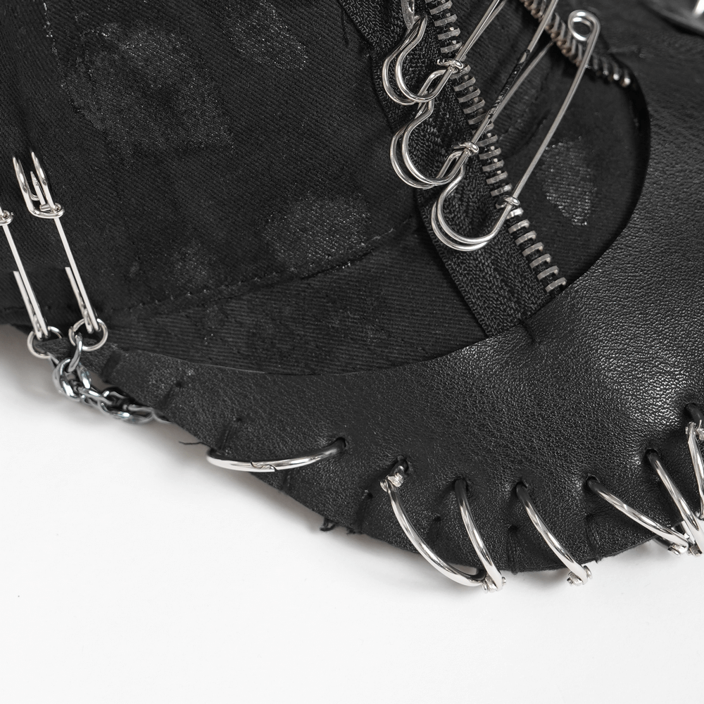 Black Gothic Safety Pin and Chain Baseball Cap featuring safety pins and chains on a black fabric background.