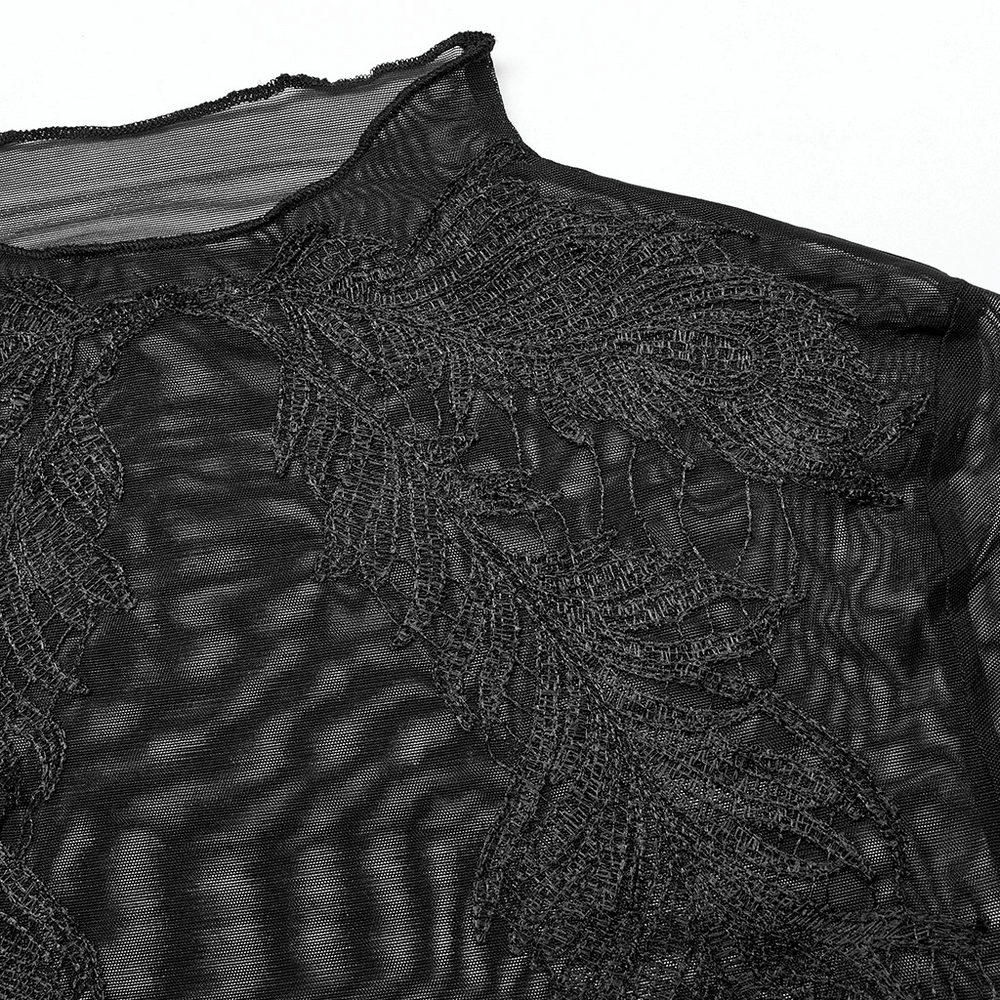 Close-up of black sheer mesh top with intricate lace feather design, perfect for edgy punk style layering.