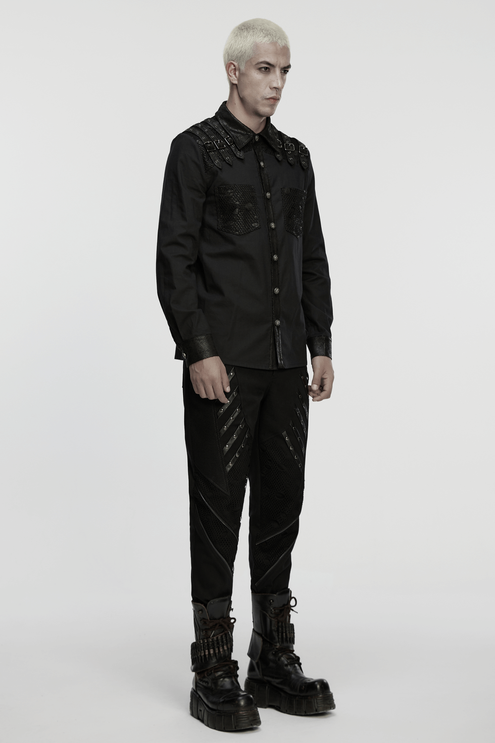 Black Gothic Shirt with Buckle Shoulder and Mesh Detail worn by a model, featuring edgy design and skull buttons.