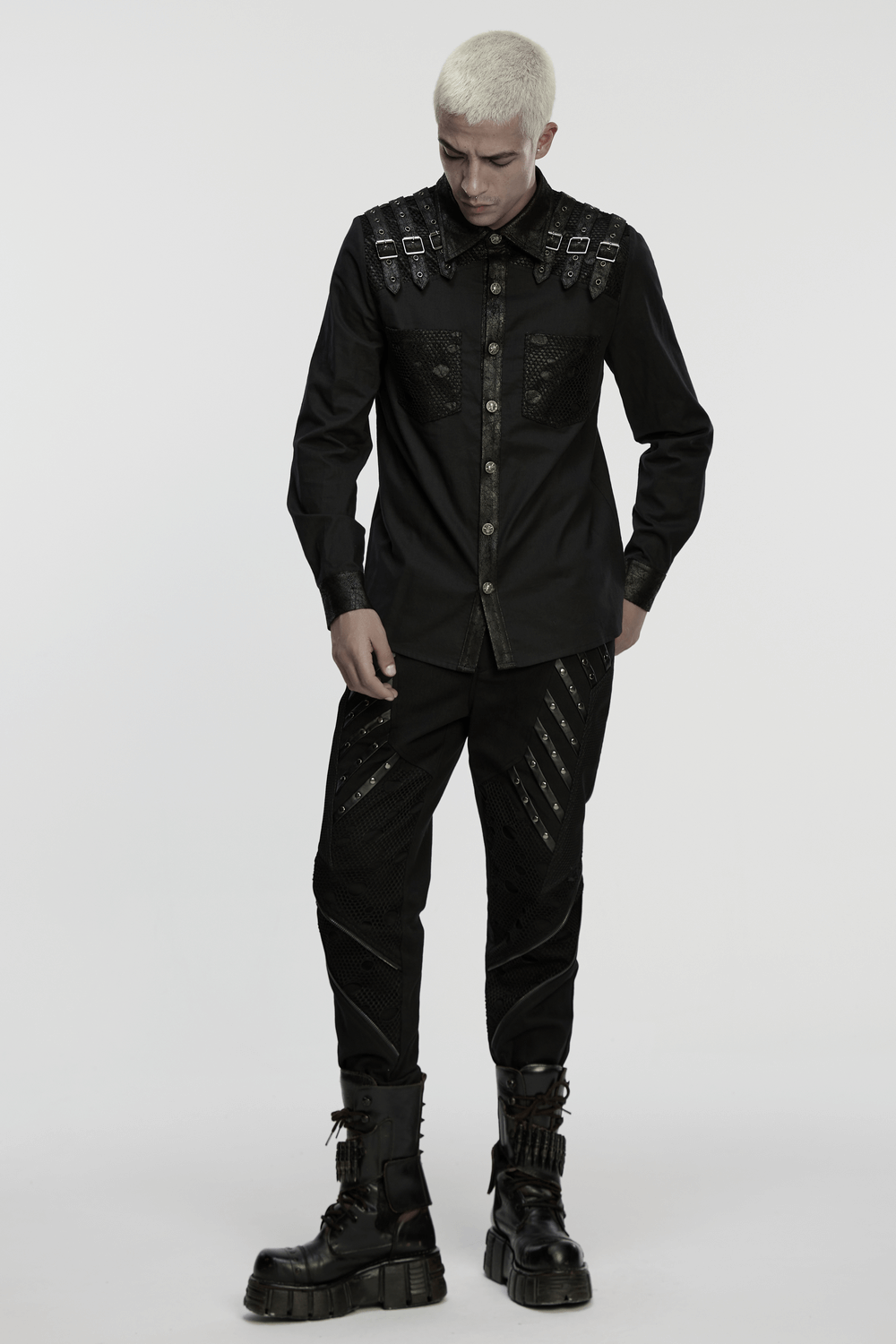 Black Gothic Shirt with Buckle Shoulder and Mesh Detail worn by model, featuring skull buttons and punk rock aesthetic.