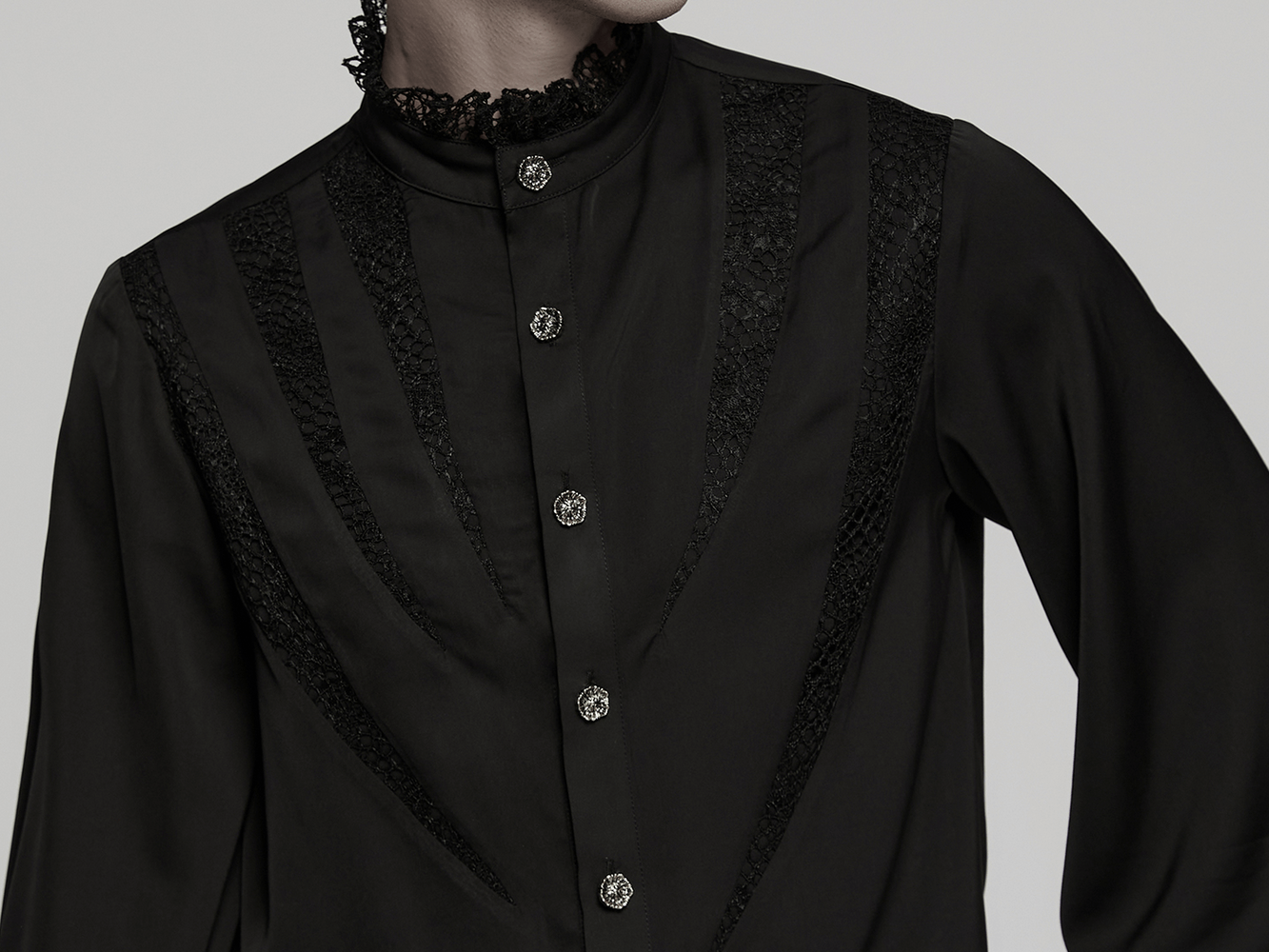 Black gothic shirt with lace and chiffon details, featuring sharp teeth segmentation and elegant cuffs.