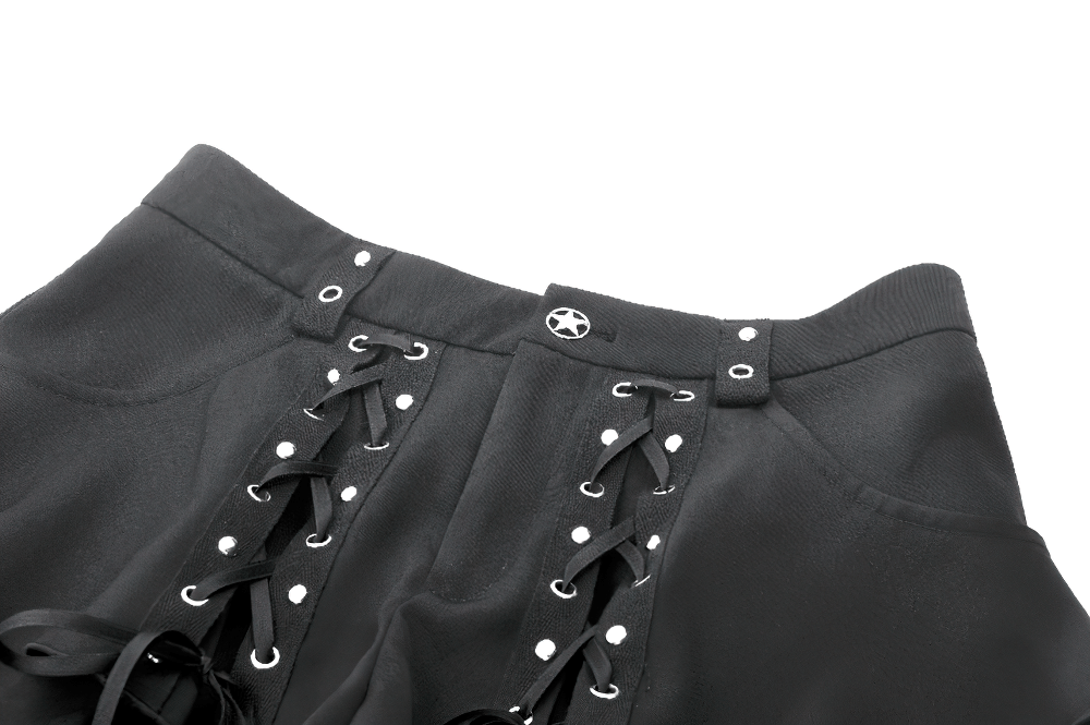 Black gothic shorts with lace-up detail and metal eyelets for a punk-inspired look.