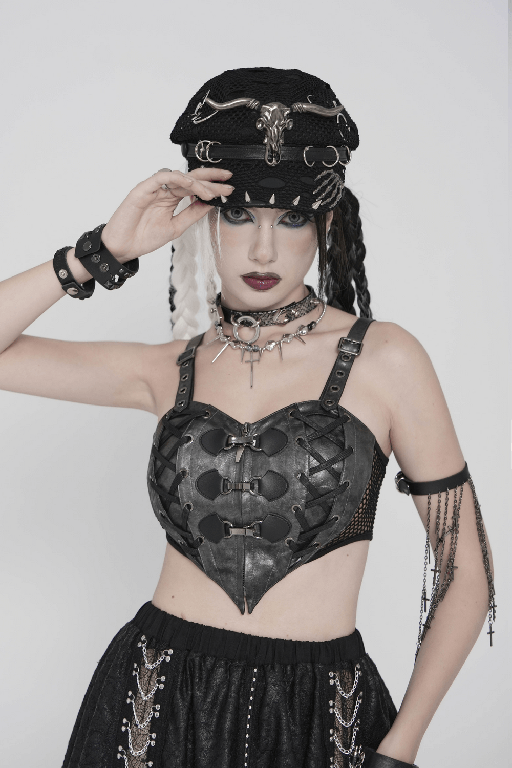 Black Gothic Skull Studded Distressed Mesh Beret paired with edgy leather outfit and punk accessories for a bold look.