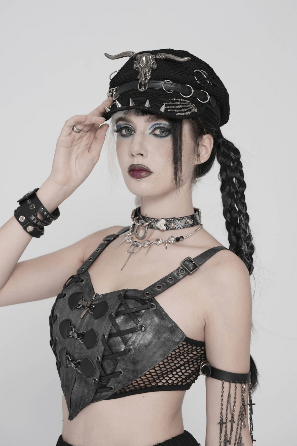 Black Gothic Skull Studded Distressed Mesh Beret worn by model showcasing punk style fashion.