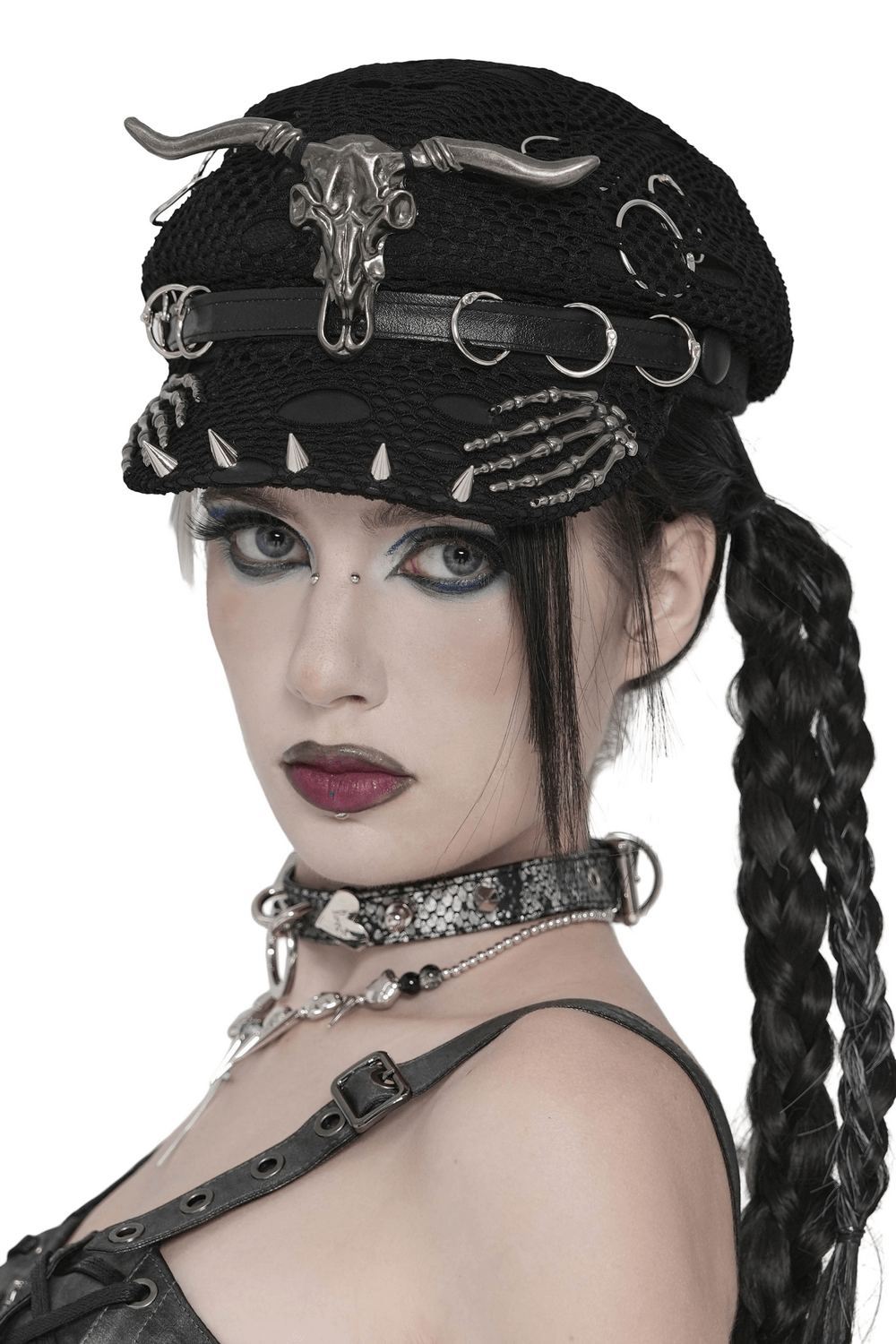 Black Gothic Skull Studded Distressed Mesh Beret worn by model with dark makeup and braided hair.